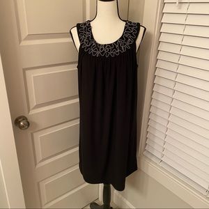 Carina|| Black sleeveless dress with 3-d silver zipper design around collar